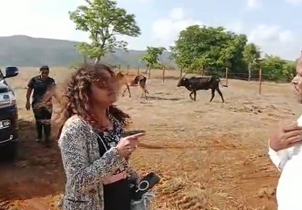 Puja Khedkar's mother is in the limelight now over a purported old video of her going viral, showing her yelling at a man while waving a pistol.

 - X/@tweets_prateekg
